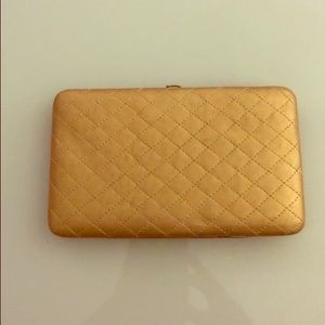 Gold clutch